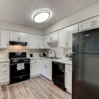 kitchen with white cabinets